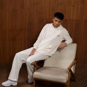 Balbap orange and white logo on cream white tracksuit.
